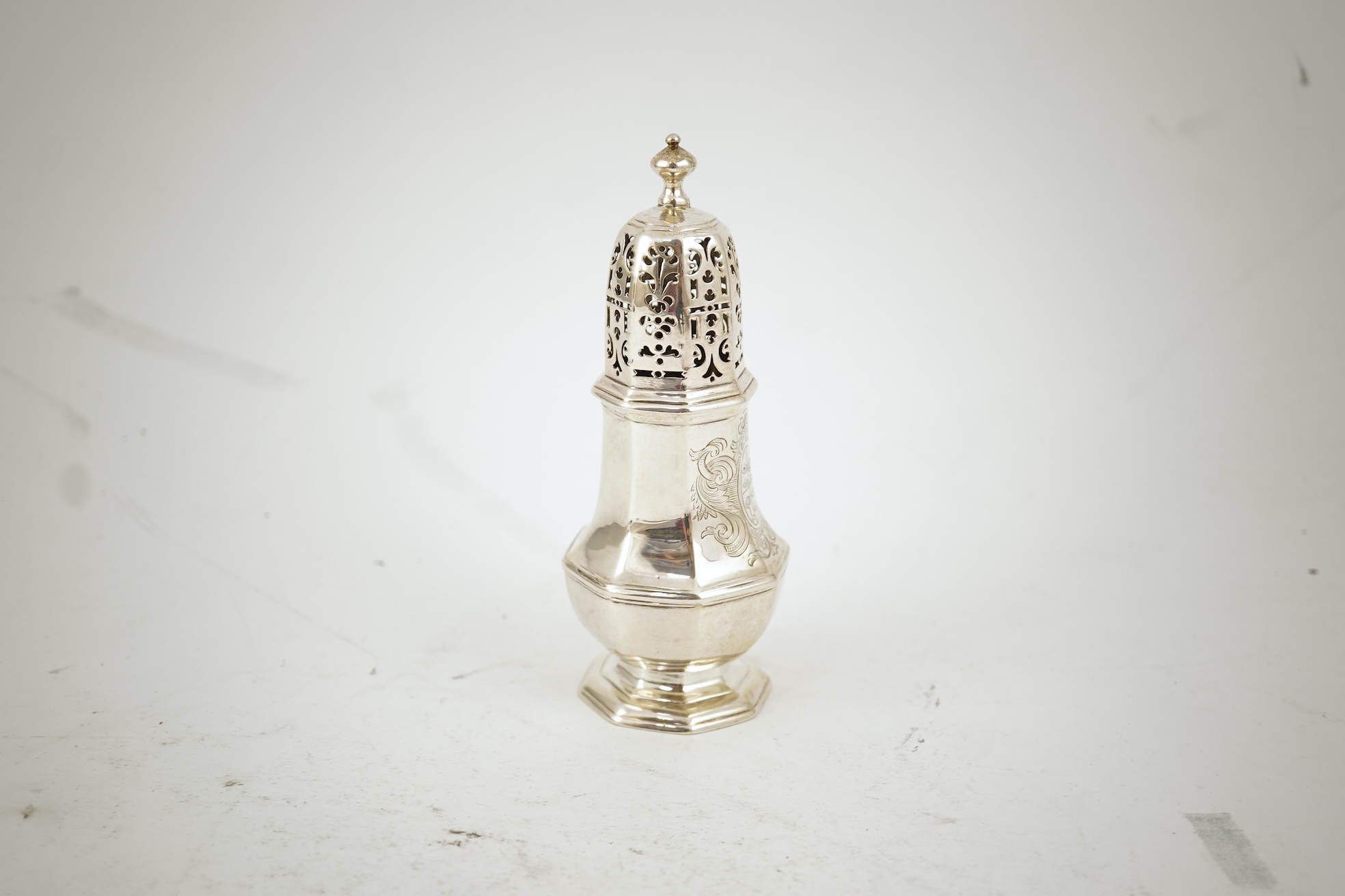 A late George I silver octagonal sugar caster, maker's mark overstruck by the date letter